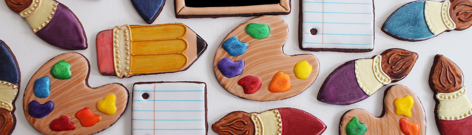 Back to school themed cookies on a white background
